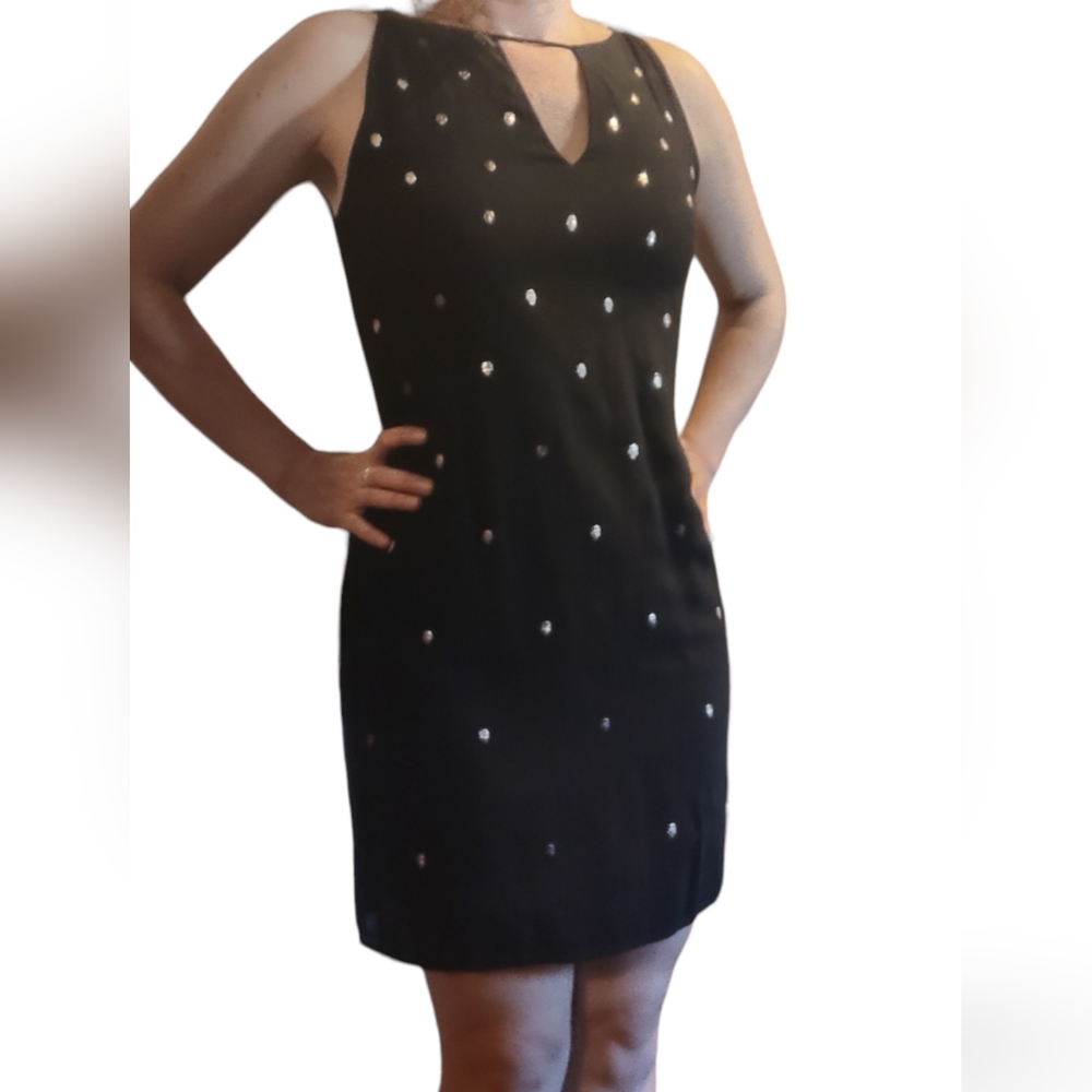 👗 Le Chateau small black skeleton decorated dress